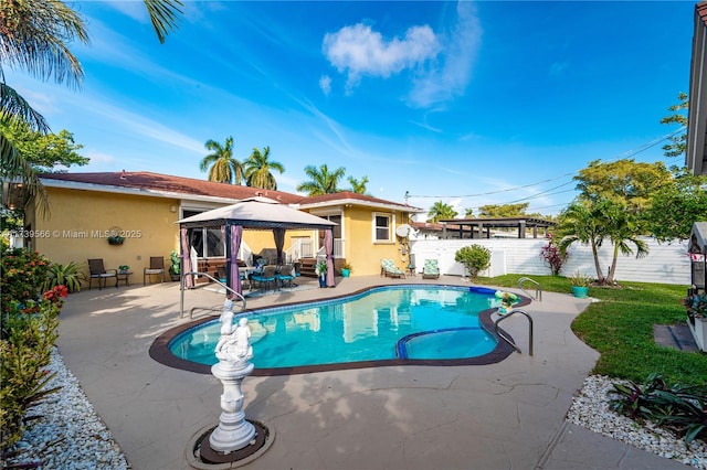 view of pool featuring a gazebo and a patio