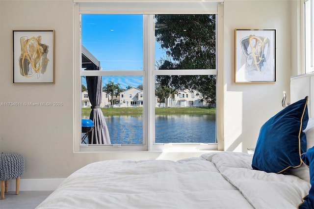 bedroom with a water view