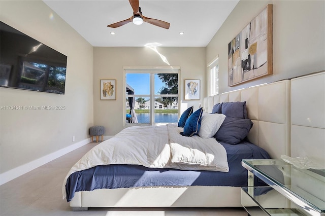 bedroom with light tile patterned floors and ceiling fan