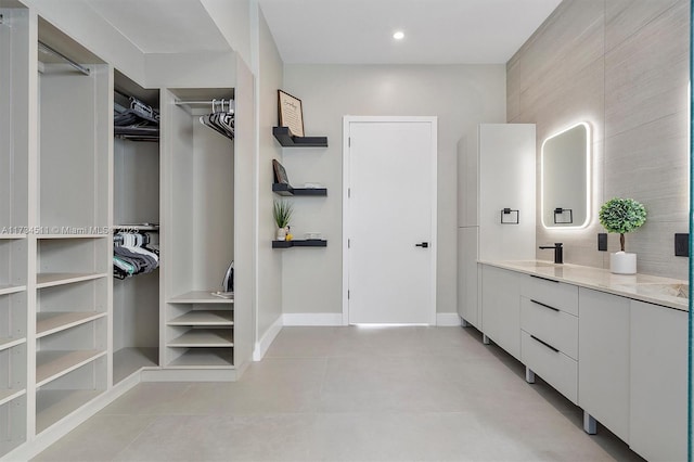 bathroom featuring vanity and tile patterned flooring