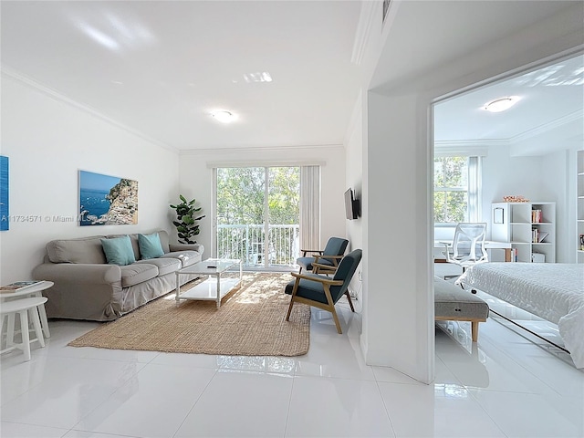 living room with crown molding, light tile patterned flooring, and a wealth of natural light