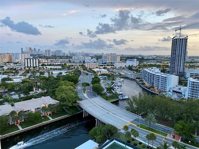 aerial view at dusk with a water view