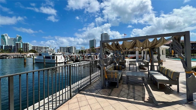 view of patio featuring a water view