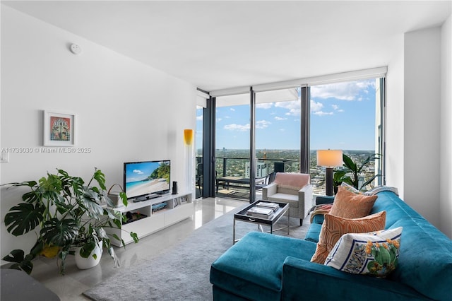 living room featuring concrete floors and floor to ceiling windows