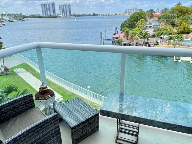 balcony featuring a water view