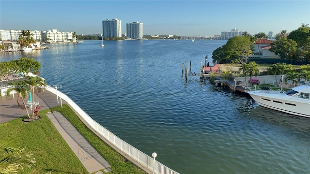 property view of water with a view of city and a boat dock