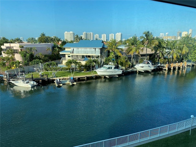 water view with a dock and a city view