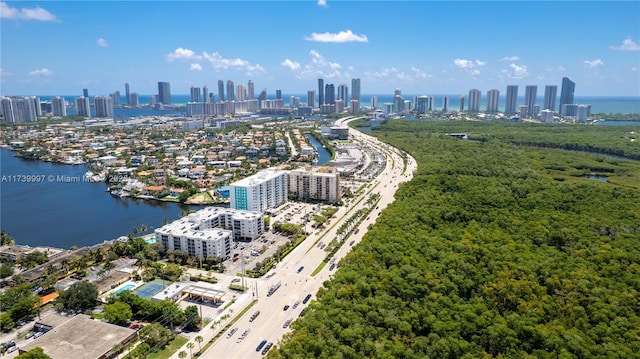 bird's eye view featuring a view of city and a water view