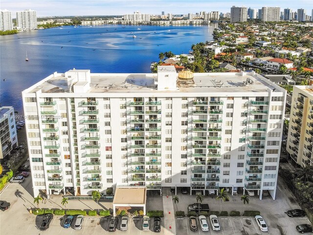 birds eye view of property featuring a water view