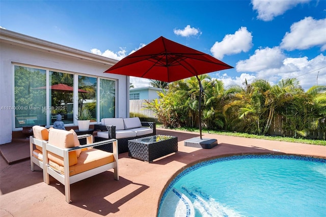 view of swimming pool with an outdoor hangout area and a patio