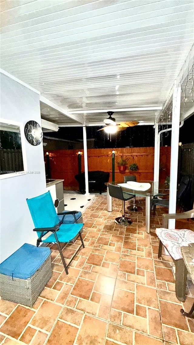 view of patio with ceiling fan