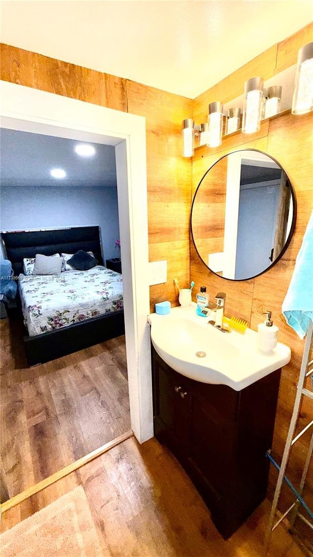 bathroom featuring vanity and hardwood / wood-style flooring