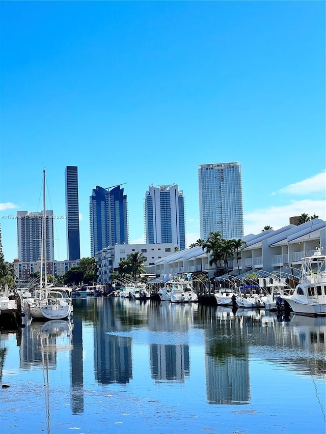 property's view of city featuring a water view