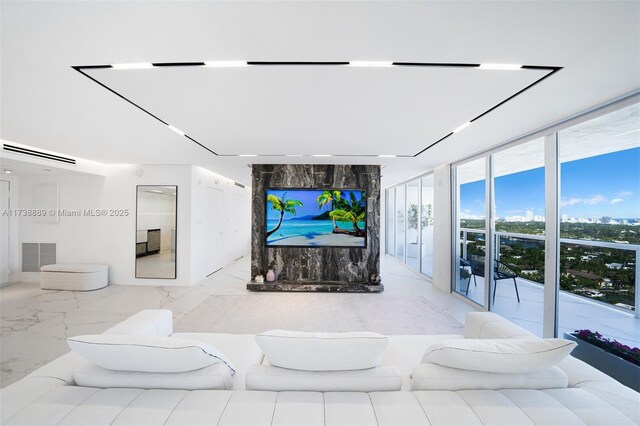 living room featuring expansive windows