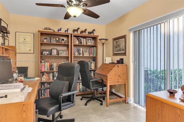 office area with ceiling fan