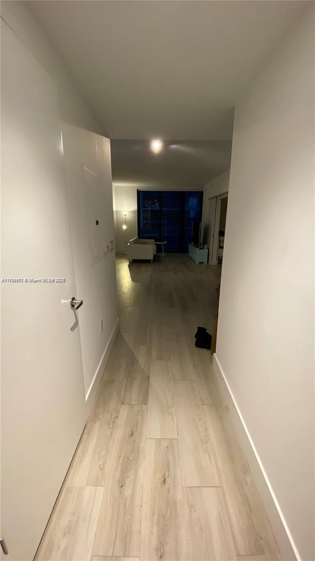 hallway featuring light hardwood / wood-style floors