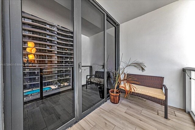 hallway with tile patterned floors