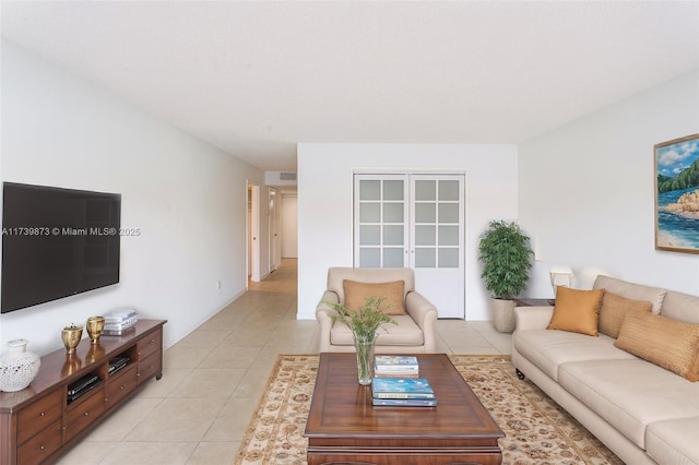 living room featuring light tile patterned flooring