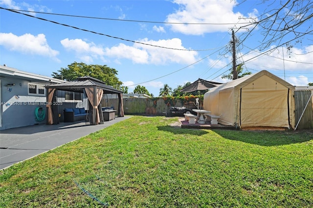 view of yard with a gazebo and a patio area