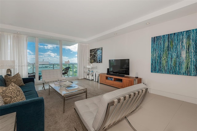 living room with a wall of windows