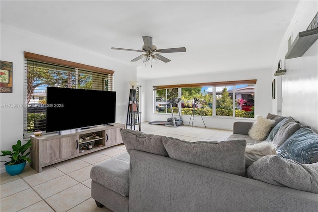 tiled living room featuring crown molding and ceiling fan