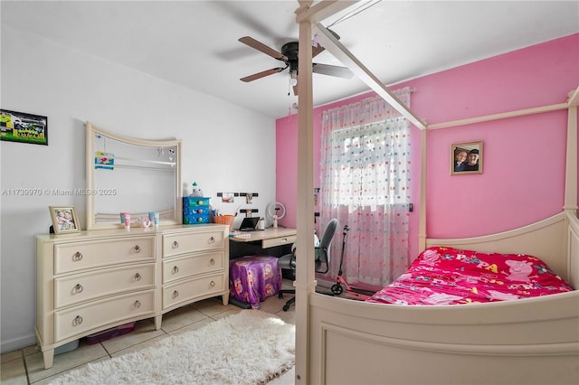 bedroom with light tile patterned flooring and ceiling fan