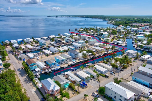 drone / aerial view featuring a water view