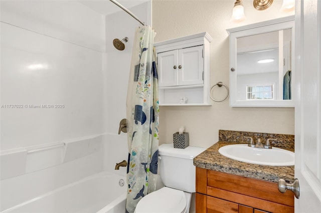 full bathroom featuring vanity, shower / bathtub combination with curtain, and toilet