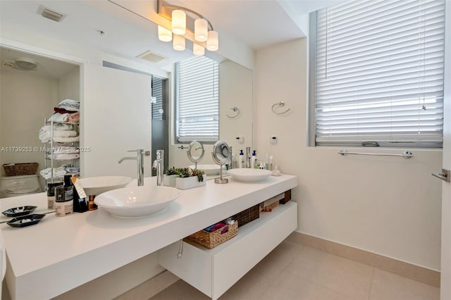 bathroom with vanity and tile patterned floors