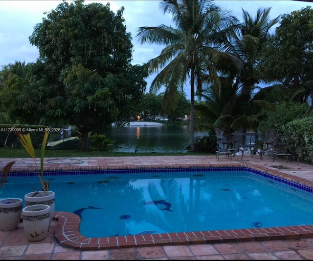 pool featuring a hot tub