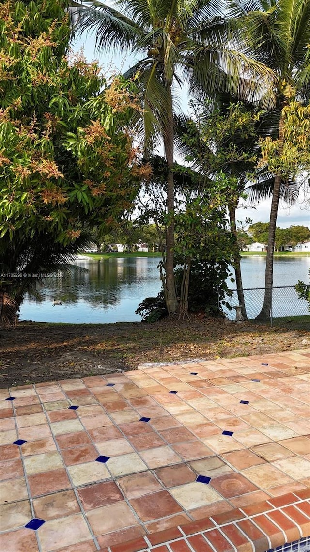 property view of water with fence