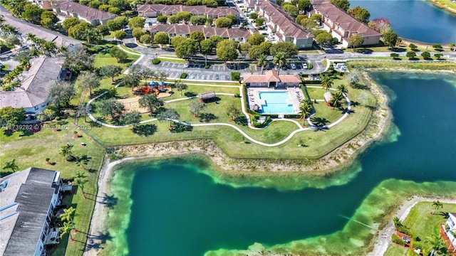 drone / aerial view with a water view