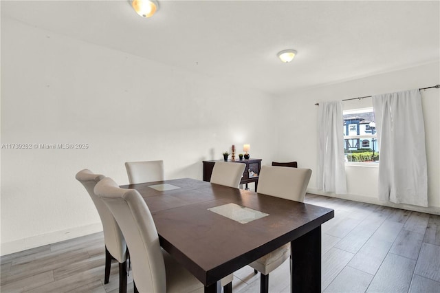 dining room featuring light hardwood / wood-style floors