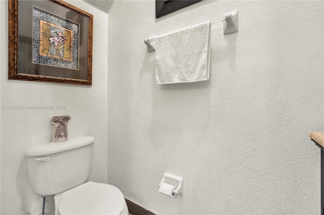 bathroom featuring toilet