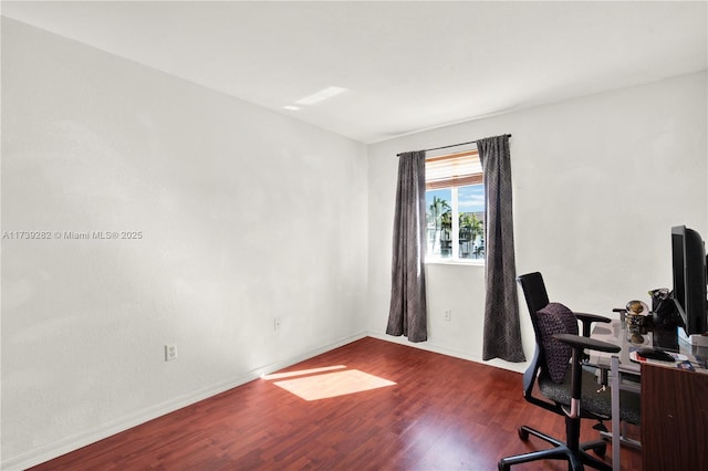 office space with dark hardwood / wood-style floors