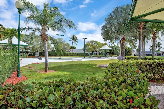 view of community with a gazebo and a lawn