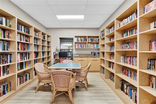 interior space with a drop ceiling