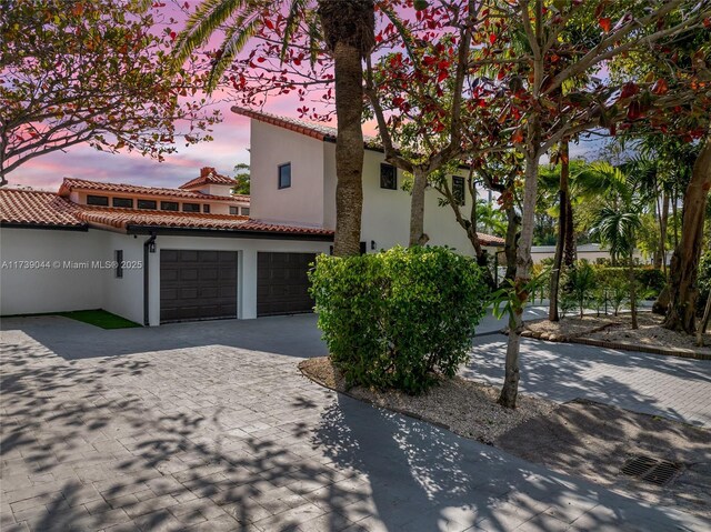 view of front of property with a garage