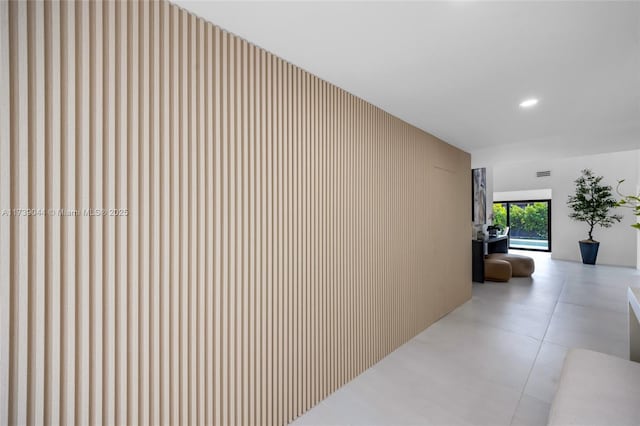 hallway with recessed lighting and visible vents