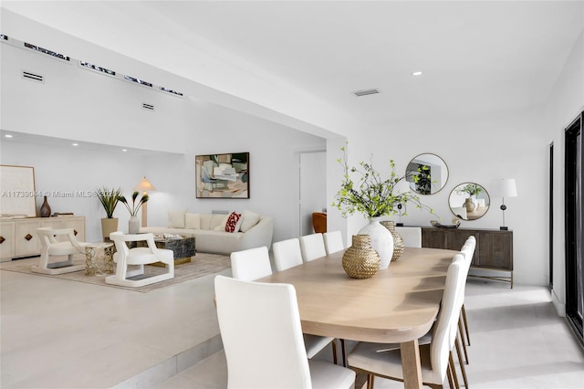 dining room with visible vents and recessed lighting