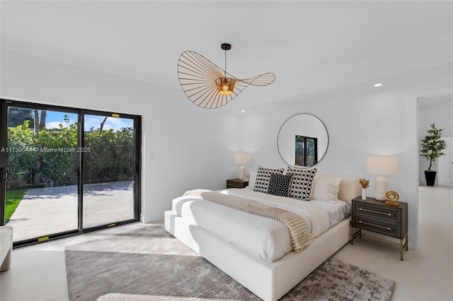 bedroom featuring access to outside and recessed lighting