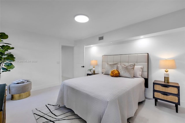 bedroom featuring light carpet, baseboards, and visible vents