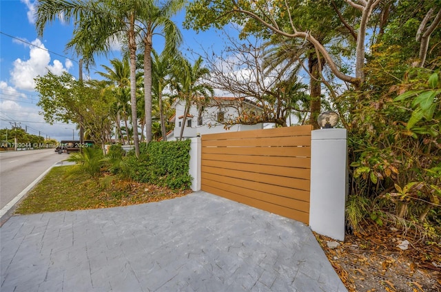 view of gate featuring fence