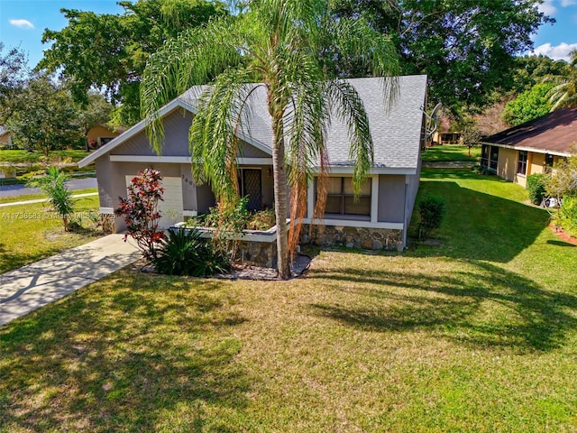 view of front of home featuring a front yard