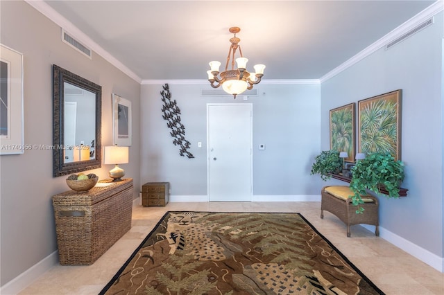 entryway with ornamental molding, a chandelier, and visible vents