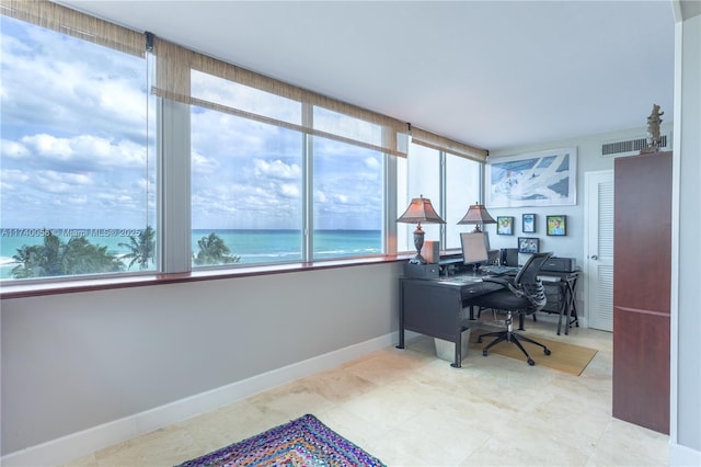 office area with visible vents and baseboards