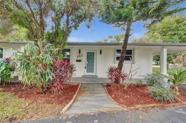 view of front of house featuring a carport