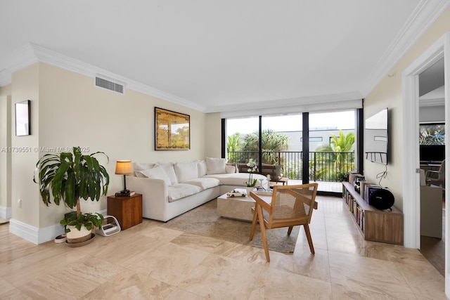 living room with visible vents, crown molding, and baseboards