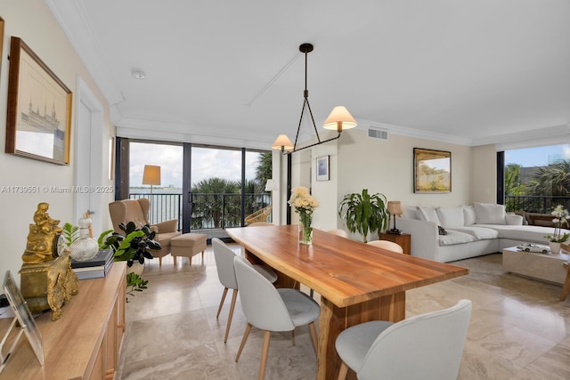 801 N Venetian Dr Unit 201, Miami, FL 33139 - dining room featuring crown molding, light marble finish flooring, and floor to ceiling windows