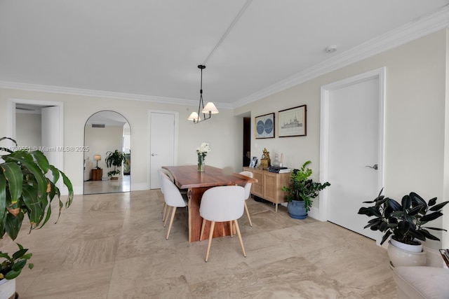 801 N Venetian Dr Unit 201, Miami, FL 33139 - dining room with ornamental molding, a chandelier, light marble finish flooring, and arched walkways